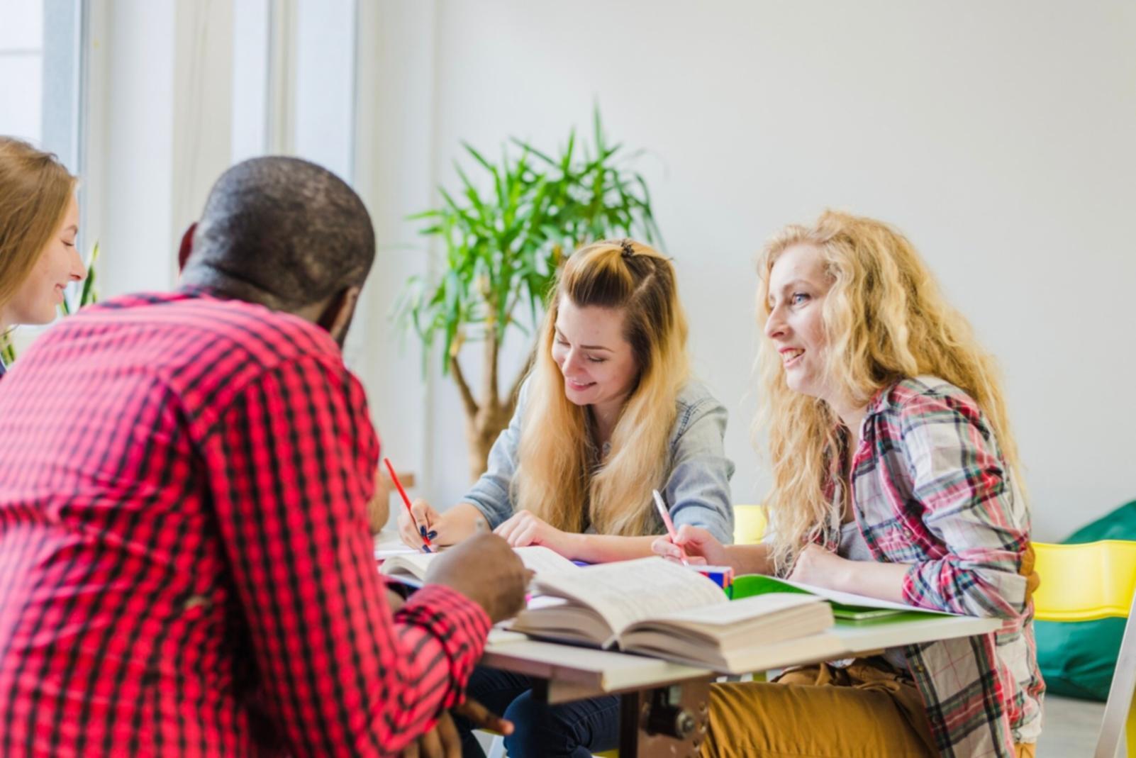 Economic data analysis classroom with real-time market indicators and interactive learning materials